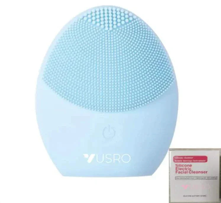 Ultrasonic Silicone Facial Cleansing Brush in blue, electric skin care device for deep cleansing.