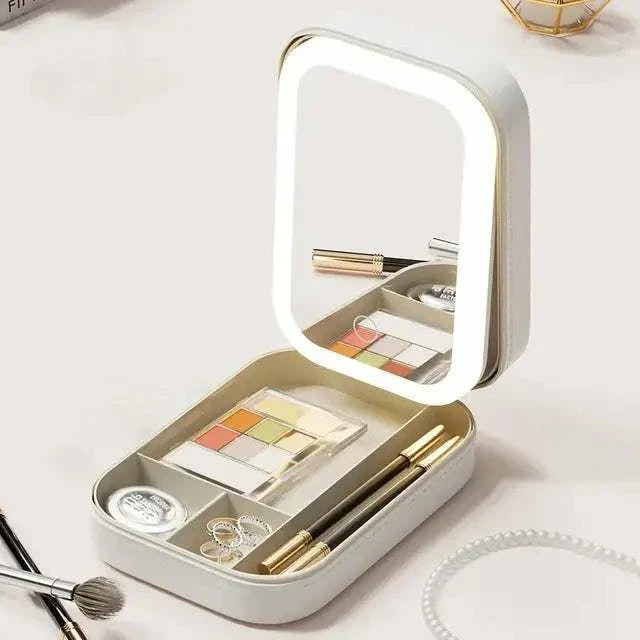 LED Mirror Makeup Storage Box with built-in lighting and compartments for cosmetics and jewelry.