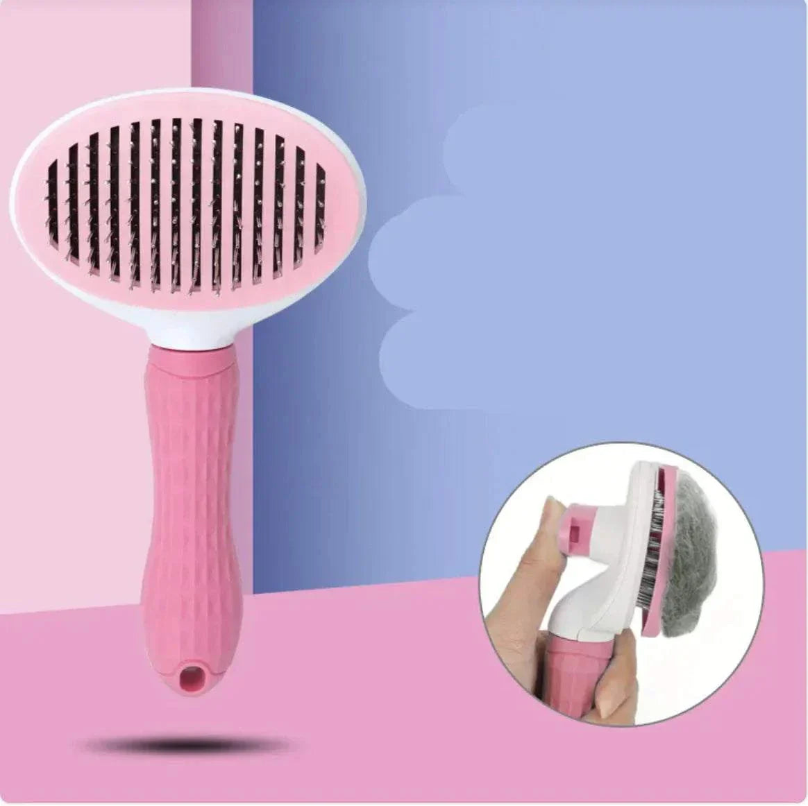 Pink pet hair removal comb with ergonomic handle and self-cleaning feature.